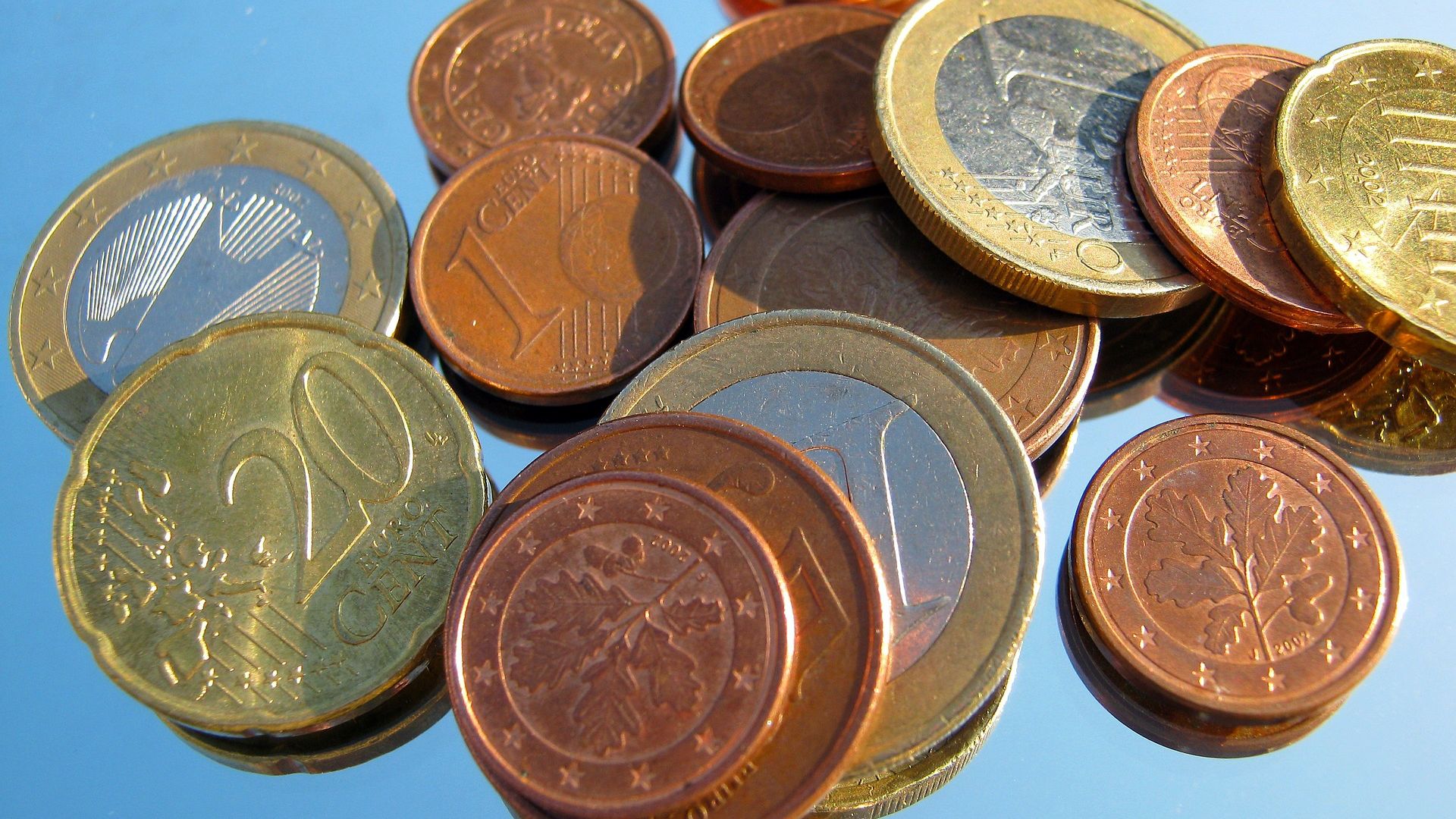 Geldmünzen, Cents, Groschen und Euros
